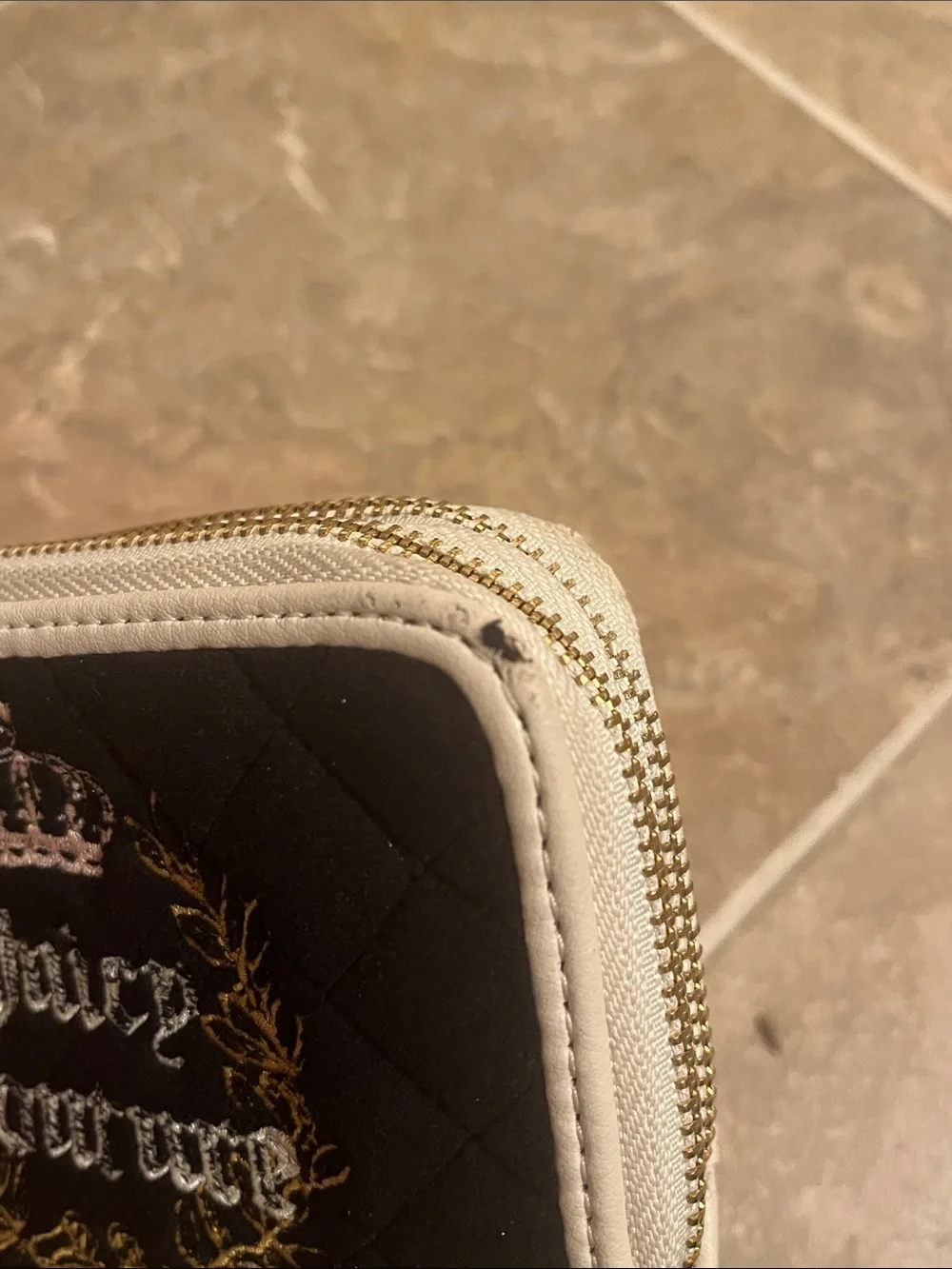 Juicy Couture Black Quilted Wallet with White Trim and Gold Crest